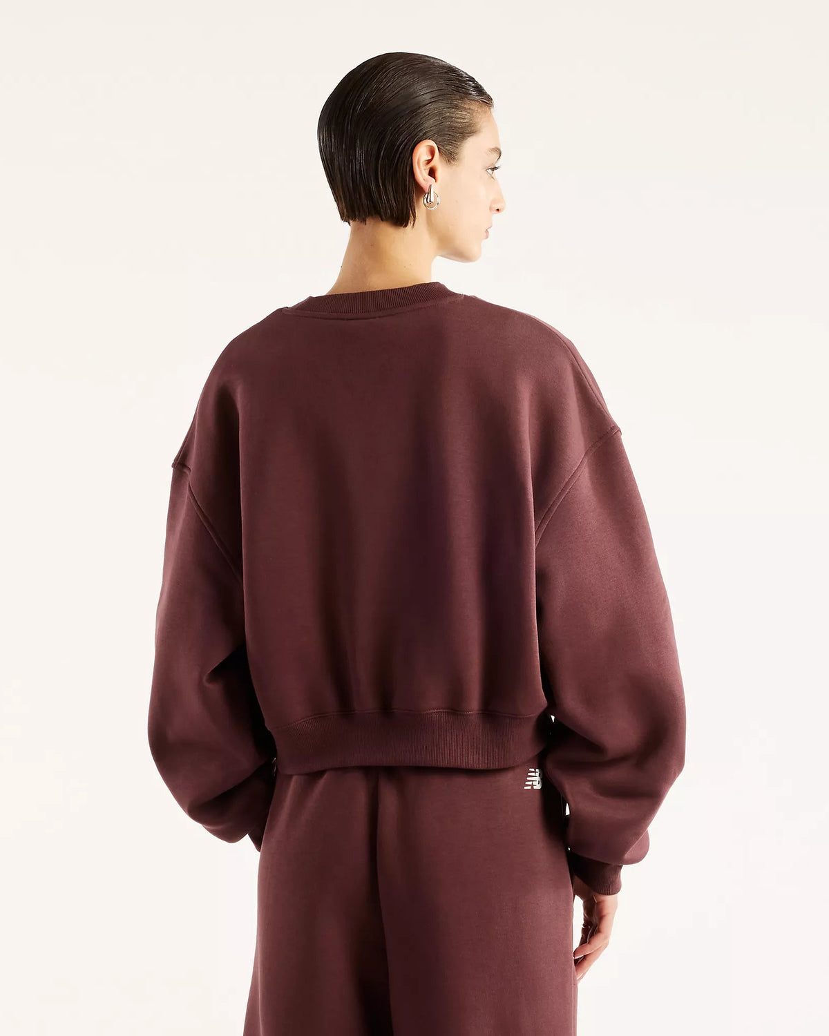 Camisola Mulher New Balance Trackside Fleece Crew Bordô New Balance
