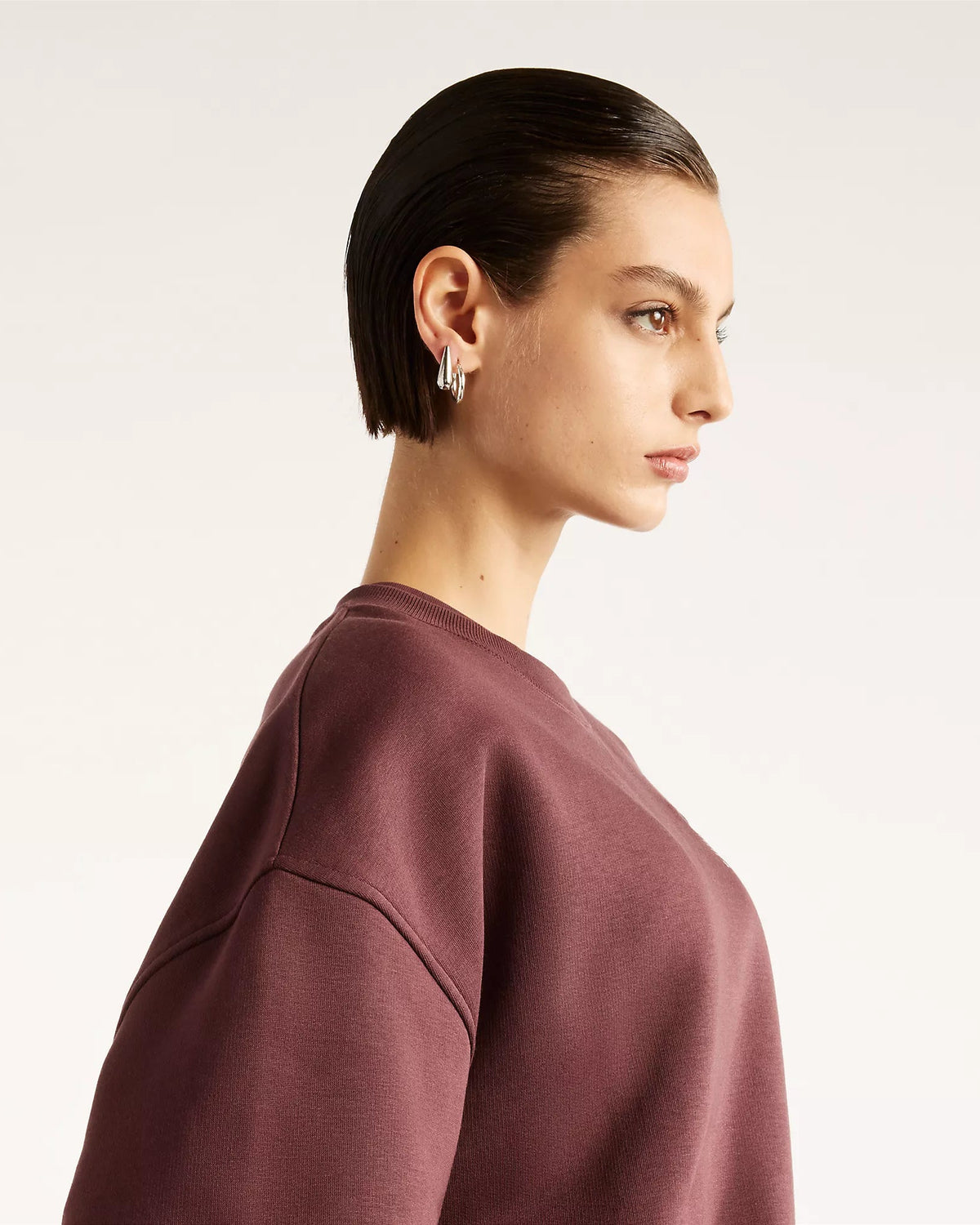 Camisola Mulher New Balance Trackside Fleece Crew Bordô New Balance