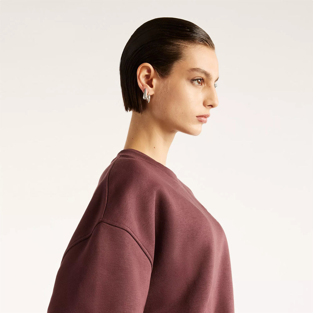 Camisola Mulher New Balance Trackside Fleece Crew Bordô New Balance