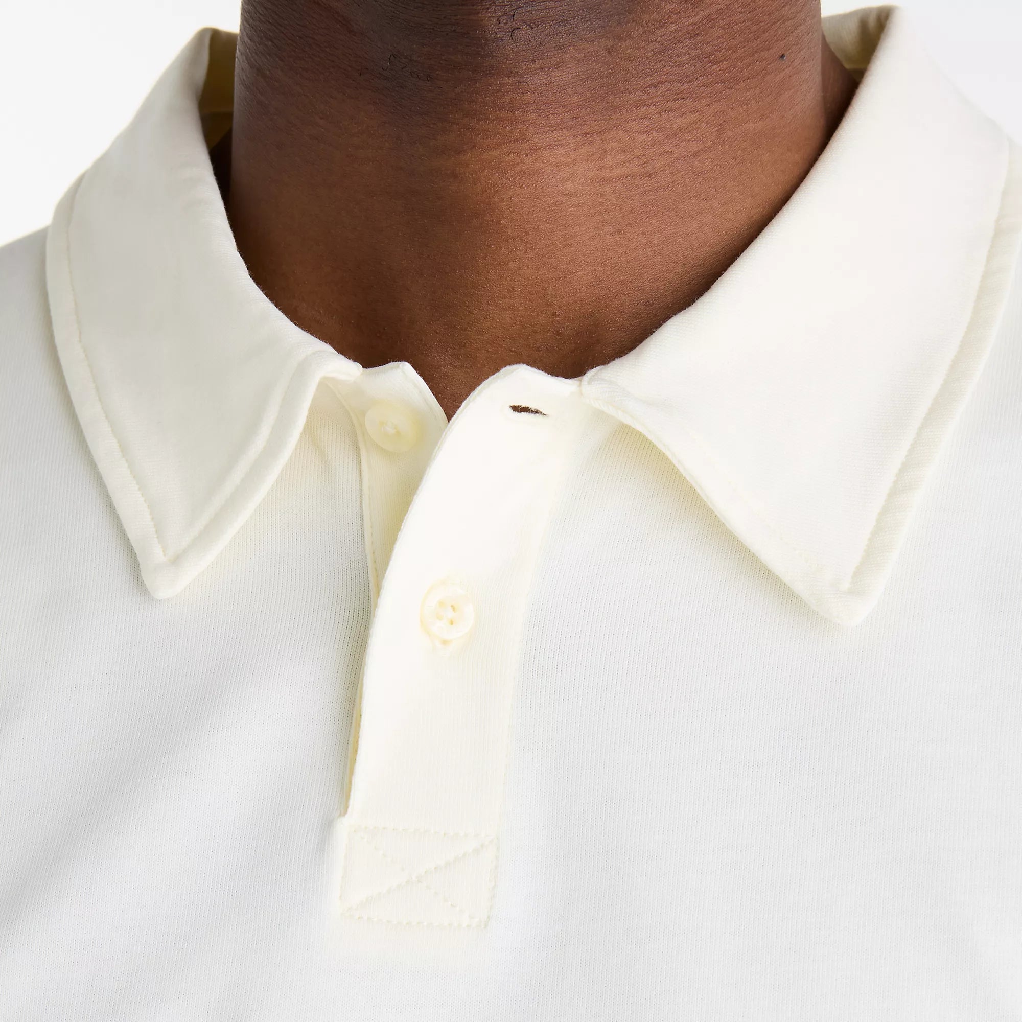 Camisola Polo Homem New Balance Legacy Rugby Bege/Castanho New Balance