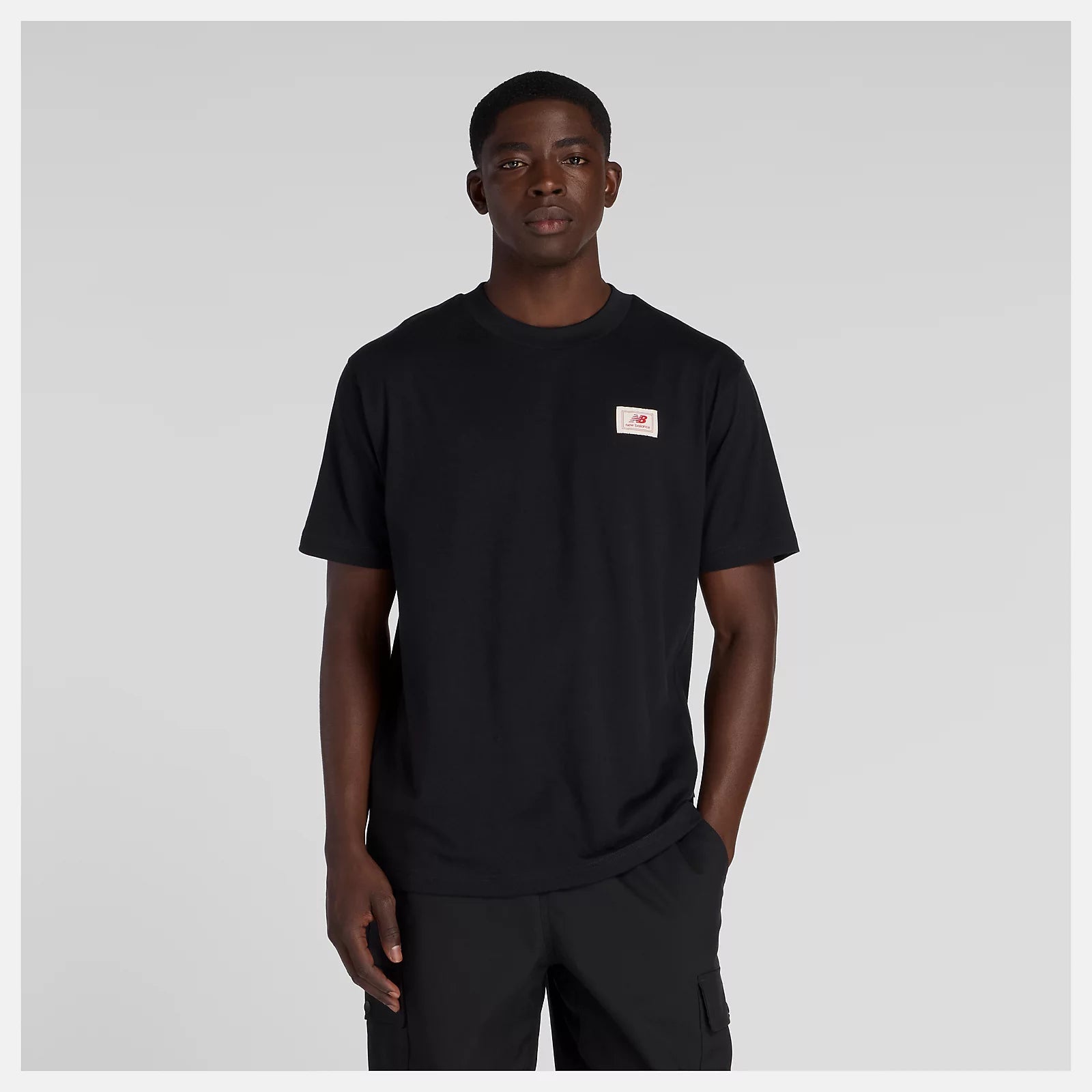 New Balance T-Shirt Woven Label Preta/Vermelha New Balance