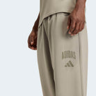 Calças Homem Adidas Collegiate Cardadas Verdes Adidas 