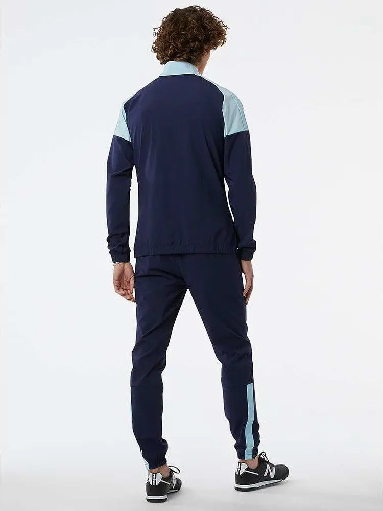 New Balance Fcp Travel Woven Suit Azul New Balance