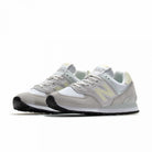 New Balance 574 Cinza/Amarela New Balance 