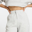 New Balance Calças Essentials Cinza New Balance 